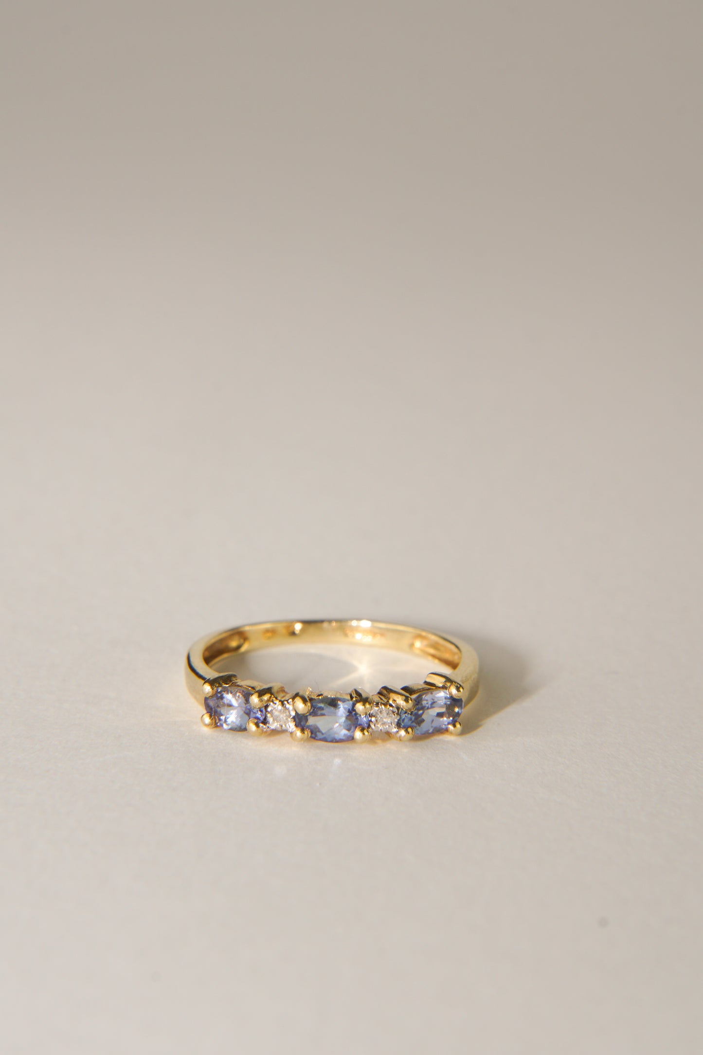 DINA | TANZANITE & DIAMOND HALF ETERNITY RING